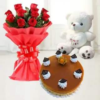 12 red roses  with 6 inch teddy bear with black forest cake