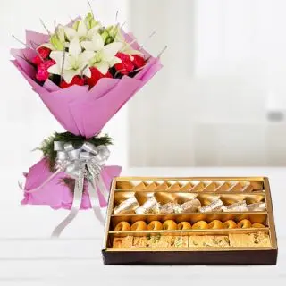 Bunch of exotic mix flowers with Half kg assorted sweets