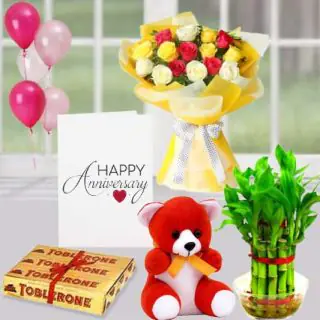 Bunch of 10 mix roses, set of 3 toblerone chocolates, 6 inch teddybear 2 layer Lucky bamboo plant ,5 blown balloons with anniversary greeting card