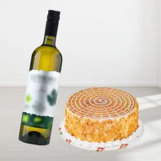 butterscotch cake with bottle of white wine 