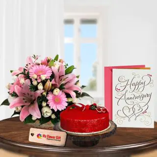 Exotic mix flowers with half kg red velvet cake with anniversary greeting card 