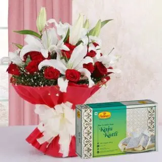 Bunch of white lilies with red roses with box of half kg kaju katli