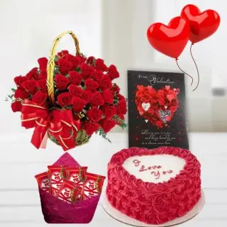 Basket of 20 red roses , 1 kg heart shape red velvet cake , 2 heart shape balloons , greeting card with pack of 5 kitkat chocolates 