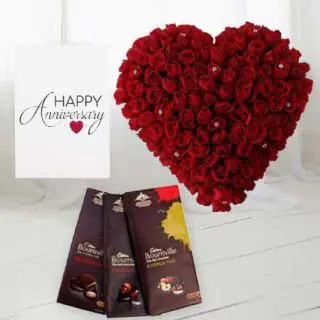 Heart shape arrangement of 50 red roses, set of 3 bournville chocolates , anniversary greeting card 