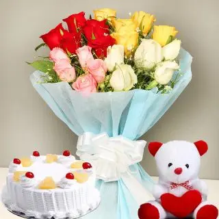 Bunch of 30 mix colour roses with Half  kg pineapple cake with 6 inch teddy bear