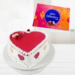  strawberry vanilla heart shape cocktail cake with box of cadbury celebrations