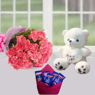  Bouquet of 10 pink carnations with 6 inch teddybear with pack of 5 dairy milk chocolates 