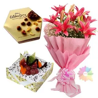 Box of rich cardbury assorted chocolates with bouquet of 5 pink Asiatic lilies with pineapple fresh cream cake with exotic fruits topping