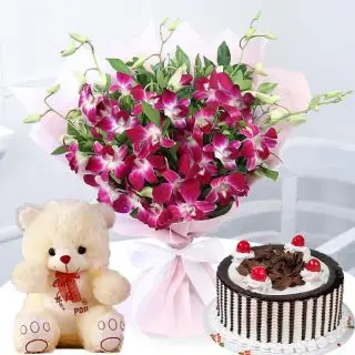 Bunch of 8 lavender orchids with 6 inch teddy &1 pound black forest cake