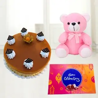Butterscotch cake with 6 inch height pink colour teddy bear with box of celebration chocolates 