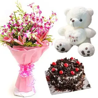 Bunch of lilies with lavender orchids, 6 inch cute teddybear & chocolate fantasy fresh cream cake 