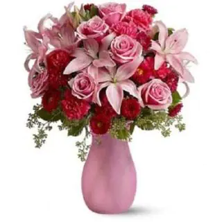 10 carnations.10 roses with 3 lilies arranged in Vase