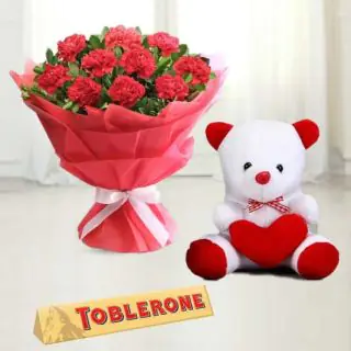  Bouquet of 10 red carnations with 6 inch teddy bear and toblerone chocolate 