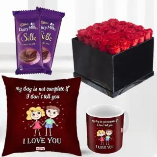 Box of 25 red roses , 2 dairy milk silk, photo cushion with photo mug 
