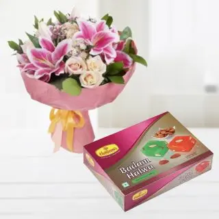 Bunch of exotic mix flowers with Box of 1 kg badam halwa