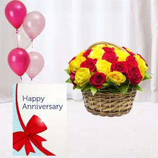 12 red and yellow roses basket arrangement , anniversary greeting card , 5 blown balloons 