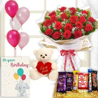 12 red roses bunch , 6 inch teddybear, Basket of assorted chocolates, birthday  Greeting card with 5 blown balloons 