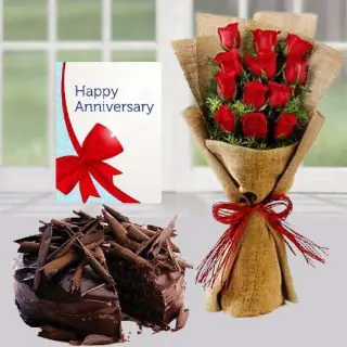 12 Red roses with jute packing, chocolate truffle cake, anniversary greeting card 