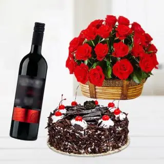Basket of 40 red roses with black forest cake with bottle of red wine