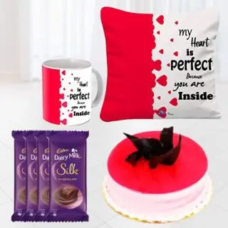 set of photo cushion with photo mug , 4 dairy milk silk chocolates, half kg strawberry cool cake 