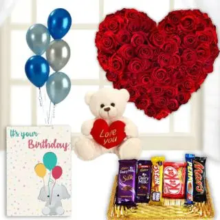 Heart shape arrangement of 30 red roses, 6 inch white teddybear, basket of assorted chocolates, birthday Greeting card with 5 blown balloons 