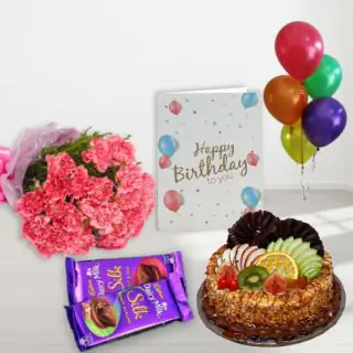Bunch of 10 pink carnations , butterscotch fruit cake, set of 2 dairy milk silk, birthday greeting card, with 5 blown balloons