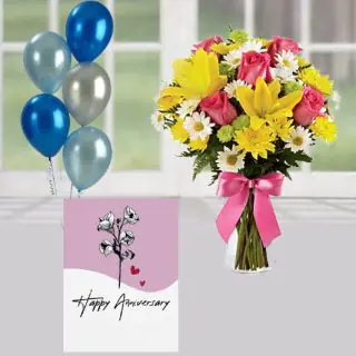 15 mix flowers arranged in glass vase, bunch of 5 blown balloons with anniversary greeting card 