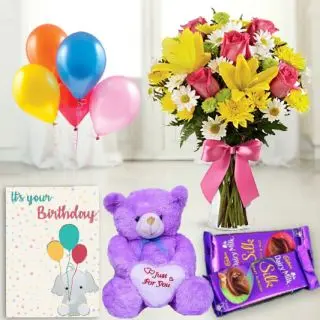 15 mix flowers arranged in glass vase , 1 feet height teddybear, set of 2 dairy milk silk, birthday Greeting card with 5 blown balloons 