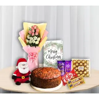 15 pink and white roses bouquet , christmas greeting card, rum n raisin cake, santa soft toy, 24 pcs ferrero rocher chocolates, 2 dairy milk silk, 2 Five star, 2 kitkat