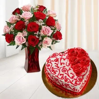 15 red and pink roses in glass vase with heart shape red velvet designer cake 