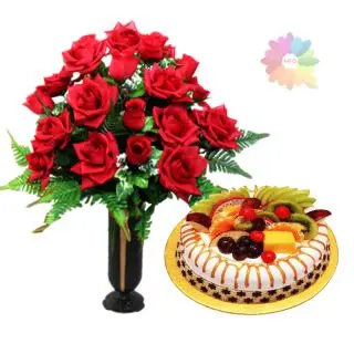 15 red roses arranged in glass vase with 1 kg mix fruit cake