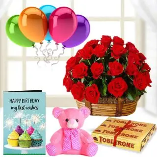 15 red roses basket, 3 toblerone chocolates, 6 inch pink teddybear, birthday Greeting card with 5 blown balloons 