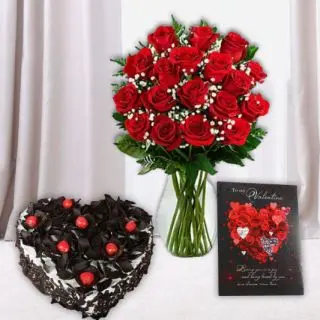 15 red roses in glass vase, 1 kg heart shape black forest cake, valentine Greeting card 
