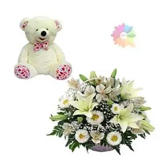 Basket of white  exotic lilies and daisies with cute 1 feet height teddybear