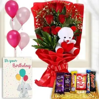 Bunch of 6 red roses with 6 inch teddybear sitting in it , Basket of assorted chocolates, birthday Greeting card with 5 blown balloons