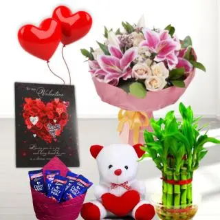 Bunch of 15 mix flowers, Basket of 10 dairy milk chocolates, 6 inch height teddybear, 2 layer Lucky bamboo plant, 5 blown balloons with greeting card