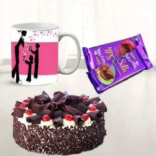 Half kg black forest cake, set of 2 dairy milk silk with photo mug 