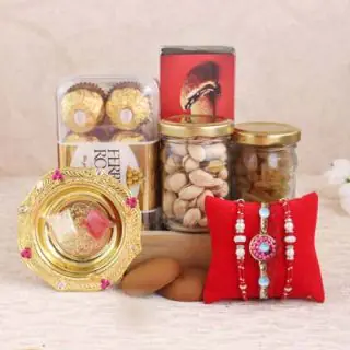 16 pcs rocher ferrero chocolates, 200 grams pistachio and raisins dryfruits in jar, with set of 3 rakhis 