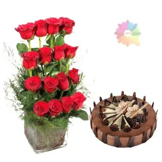 16 red roses step arrangement in glass vase with 1 kg rich chocolate cake