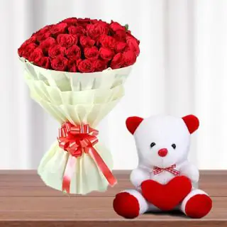 Bouquet of 50 red roses with a cute 1 feet height teddybear 