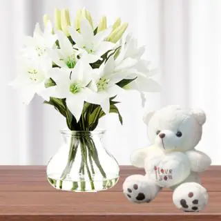 Exotic Vase Arrangement of 10 white lilies with 1 feet height teddy bear 