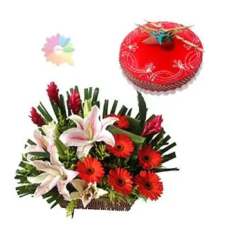 Exotic basket arrangement of lilies and gerberas with half kg strawberry cake