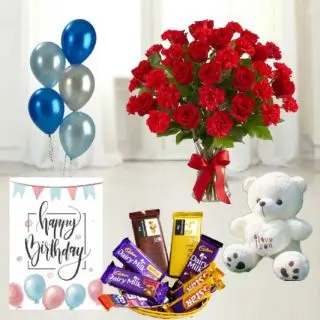 20 red roses with red carnations in glass vase, 1 feet height teddybear, Basket of assorted chocolates ,birthday  Greeting card with 5 blown balloons 
