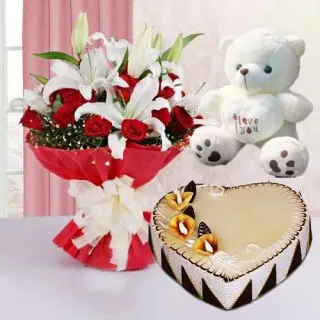 bunch of white lilies with red carnations, heart shape butterscotch cake & 6 inch teddy bear