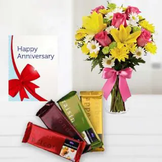 Vase arrangement of mix exotic flowers, set of 4 temptations chocolates, anniversary Greeting card