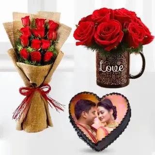 Bunch of 12 red roses, 1 kg heart shape photo cake, with 5 red roses arranged in photo mug 