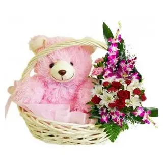1 feet height teddy sitting in flower basket with mix flower arrangement 