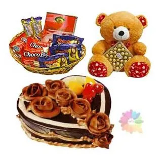 chocolate heart shape premium quality cake with exotic fruits topping with basket of assorted chocolates with 1 feet height teddybear carrying box of 24pcs rocher ferrero chocolates 