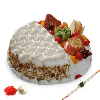1 kg  fresh cream butterscotch mixfruit cocktail premium quality cake with 1 rakhi and roli chawal