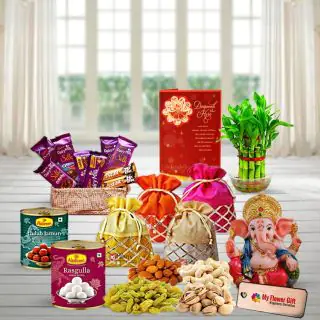 Gulab jamun, Rasgulla, 4 potlis of 1 kg assorted dry fruits, Premium Basket of dairy milk silk with five star, Ganesha idol, 2 layer lucky bamboo plant with Diwali greeting card 